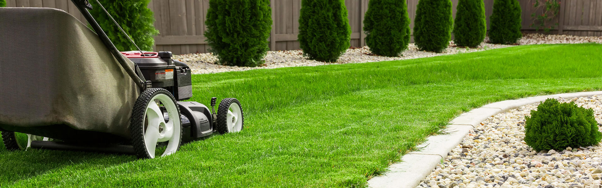 Commercial lawn maintenance with neatly edged turf
